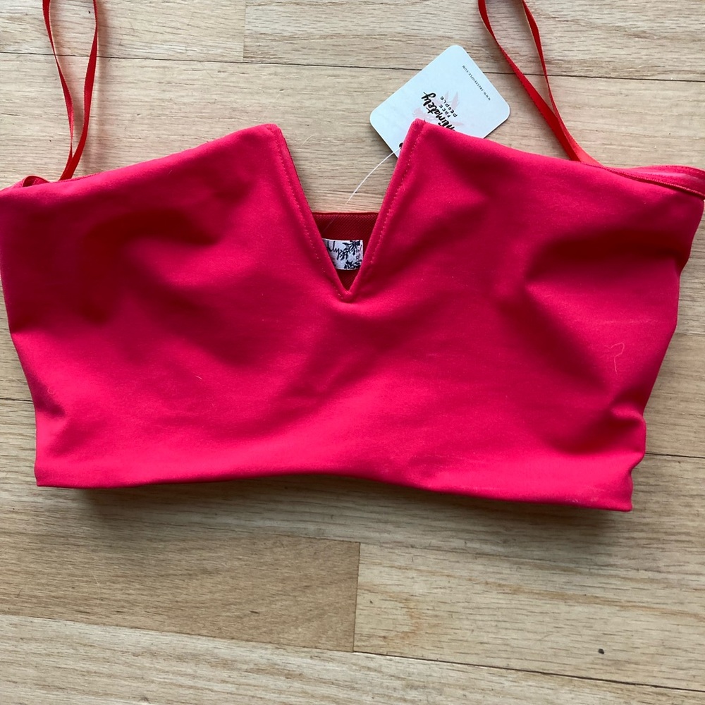New with tags. Super cute abs sexy bralette/bandeau.